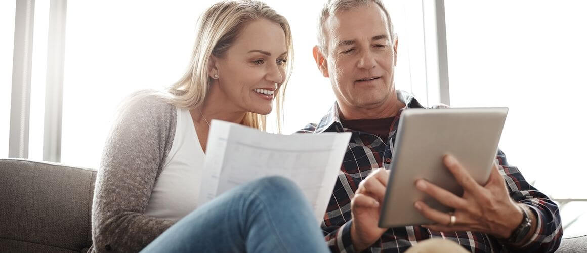 Middle aged couple budgeting.